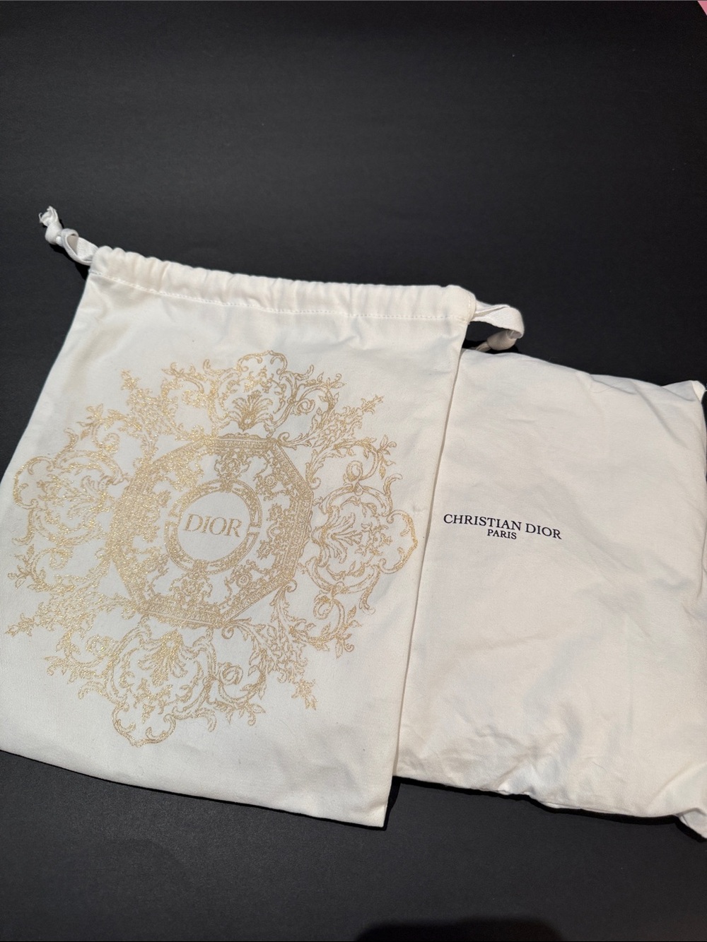 Dior Dust Bags and a Pillow